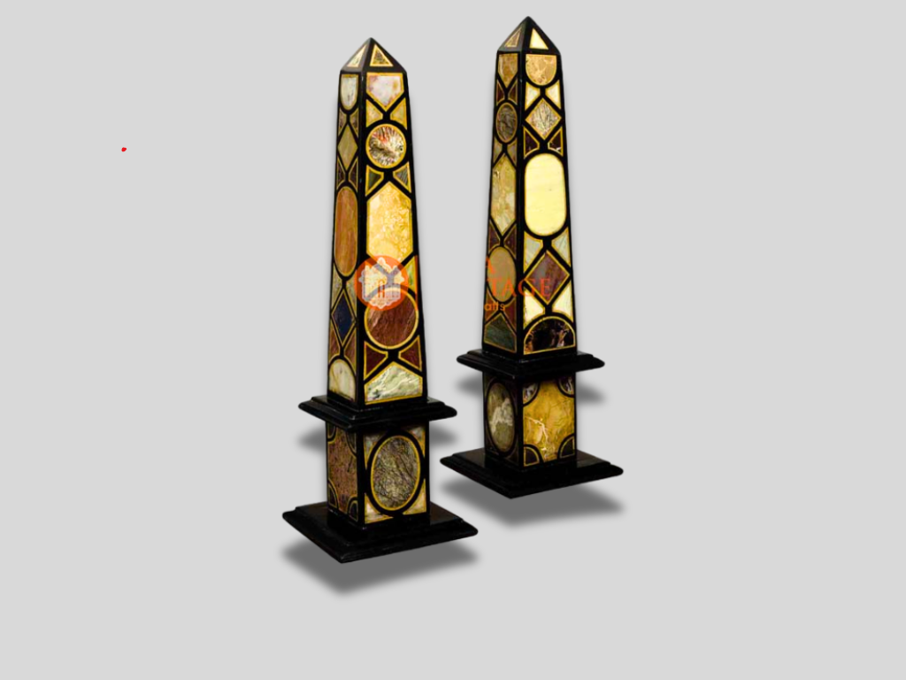 Pair of Monumental Black Marble Specimen Obelisks